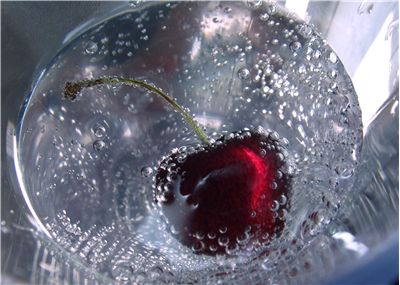 Picture Of Carbonated Water With A Cherry